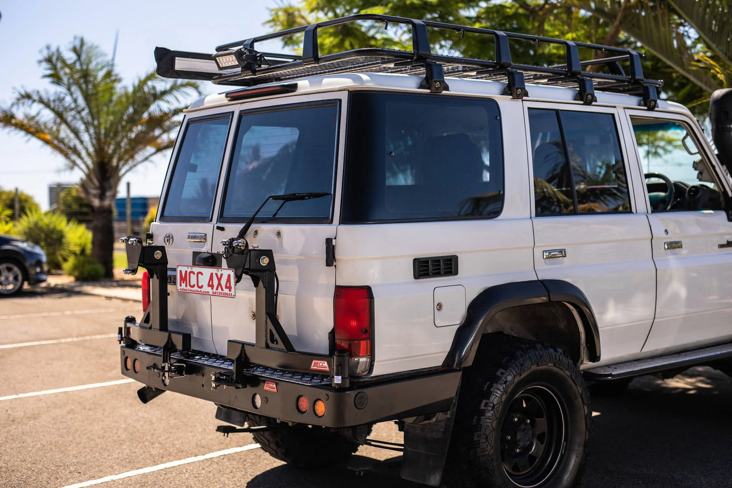MCC Rear Replacement Bumper with left and right spare wheel carriers and towbar for Toyota LandCruiser 79 Series pickup
